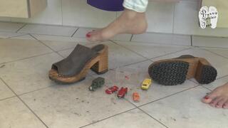 Expensive collector Cars under hard wooden Clogs