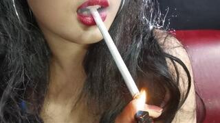 "Aiko asian smoker upclose blowing smoke in your face"