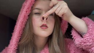 Pig nose sneezes in pink robe