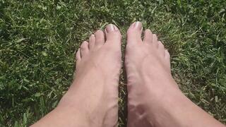 Pulling off my shoes and socks outside in the sun. Showing my gorgeous male feet.