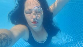 Underwater bubbles, rings, backwards
