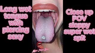 Close up of Mila's hot sexy wet sloppy tongue with sweet heart piercing
