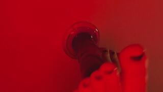 Lubed up footjob on the wall
