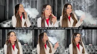 Smoking Dunhill international in white leather jacket close up!