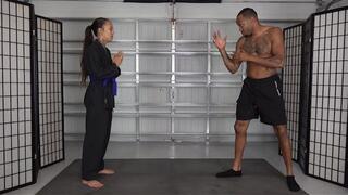 MEIKO EARNS HER RED KARATE BELT