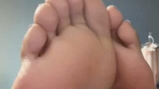 Moonette's showing off her sexy size 9 sweaty soles and pretty wiggling toes on her work desk! Clip 1