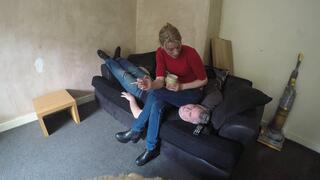 Chelsea Sits On Her Slave On The Couch
