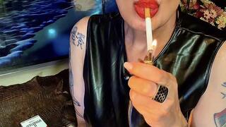 Secretary in her leather dress, working overtime, smoking for the boss—Marlboro Red 100s