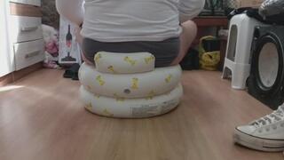 100kg person sitting in a small inflatable armchair designed to support a maximum of 15kg.