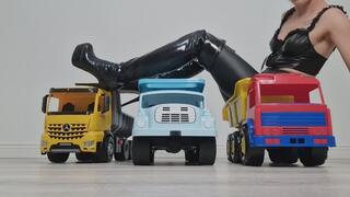 Booted Leather Babe Riding Three Dump Trucks While Farting