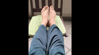 I am putting my bare feet on the chair so you can see them up close