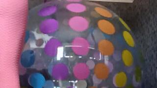 looner girl ride on big beachball and eggball