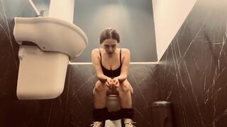 Pissing in a public toilet