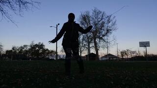 Silhouetted Bullwhip Practice