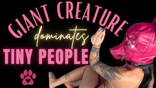 giant creature dominates tiny people