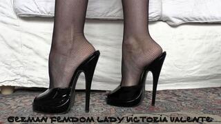 Goddess of High Heels Shows Off Her Black Patent Leather Mules