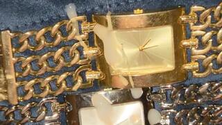 POV cumshot on the face of both a silver and gold Guess heavy metal watch!