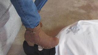 Brown Boot Face Stomp in Familyroom