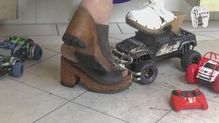 RC Cars under hard wooden Clogs