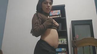 Bloated belly showing and dancing