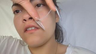 The girl catches the flu and blows her nose, snot and all.