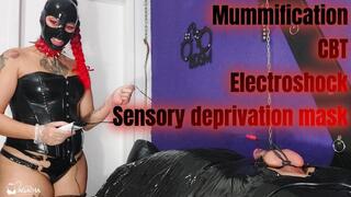 A mummified slave has his testicles trampled on and electrocuted
