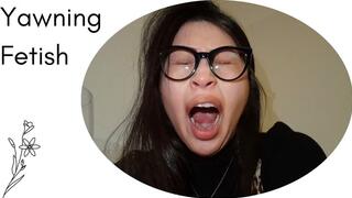 A tired latina, yawning