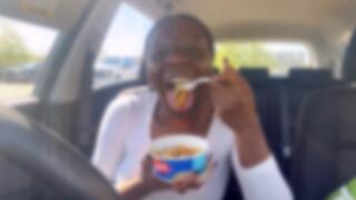 Eating hot Poutine in the Car