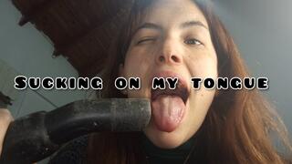 Sucking on every part of my tongue