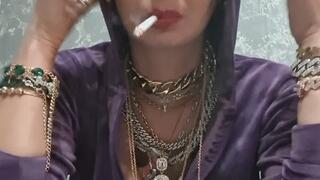 Dangling red lipstick and full of jewerlys