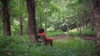 Lisa Extra scene handcuffed in woods