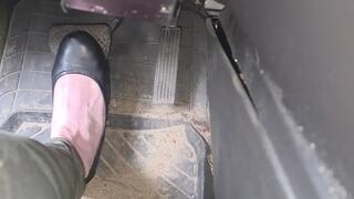 Evalynn flooring the pedal in black flats
