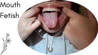 opening my enormous mouth for you in close-up..