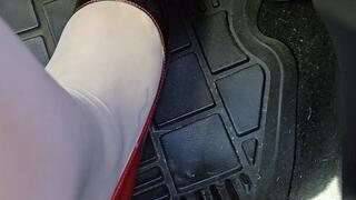 I go for a drive in my old car! I start out wearing my Louboutin pumps and tan nylons, but after a minute of driving I kick my heels off and drive around in just my nylons!! I drive fast in this one!!