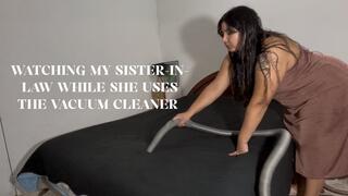 Watching my sister-in-law while she uses the vacuum cleaner