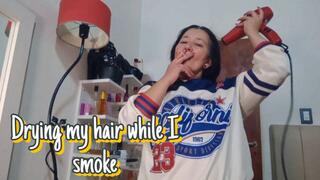 Drying my hair while I smoke