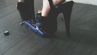 Giantess goddess Charlie Caroline Crushes a 1971 Plymouth Duster in mega black heels with painted toenails Very close right low view