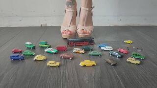 Giantess goddess Charlie Caroline Crushes a lots of tiny cars and a bus in mega Wedges with painted toenails close ground view