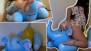 Mistress Mersiiik tramples a large inflatable elephant with her bare feet. She crushes it with all her weight, sits on it, and jumps while standing on it. foot fetish bare feet feet ass crush fetish
