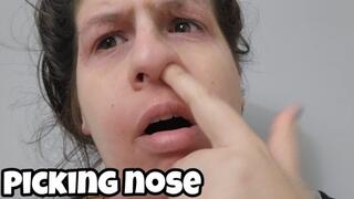 Big Nose Picking Close Up