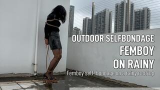 Femboy self-bondage on a rainy rooftop