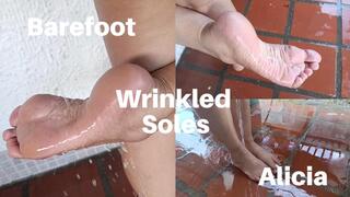 I walk barefoot in water to show my wrinkled soles (2)