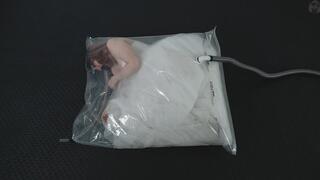 Runaway Bride a white fluffy dress in a vacuum bag