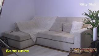 Kitty Blair vacuuming first time her new living room close can