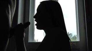 Lulu's silhouette blowjob with a cum-in-mouth finish