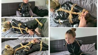 C4SBondage26 A slut in a tight fitting bodysuit gagged and tightly bound with rope on the bed I tickled the soles of her feet from behind