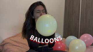 Blowing up & popping balloons