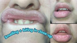 Smelling + biting my lips
