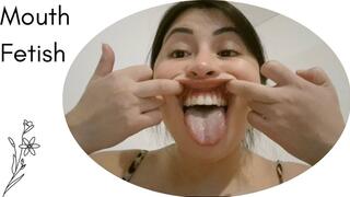 Opening my enormous mouth wide.. chattering my crooked teeth and drooling..