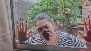 My face completely distorted against the glass